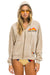 JAZZ ASPEN SNOWMASS 2024 ZIP HOODIE RELAXED - SAND