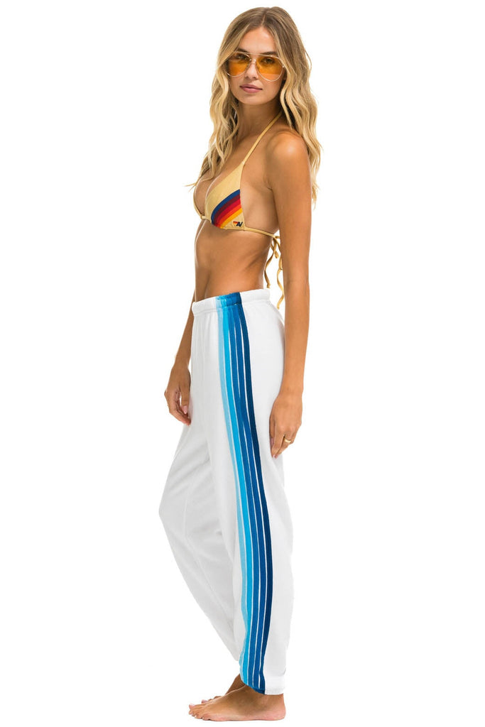 Blue sweatpants with sales white stripe